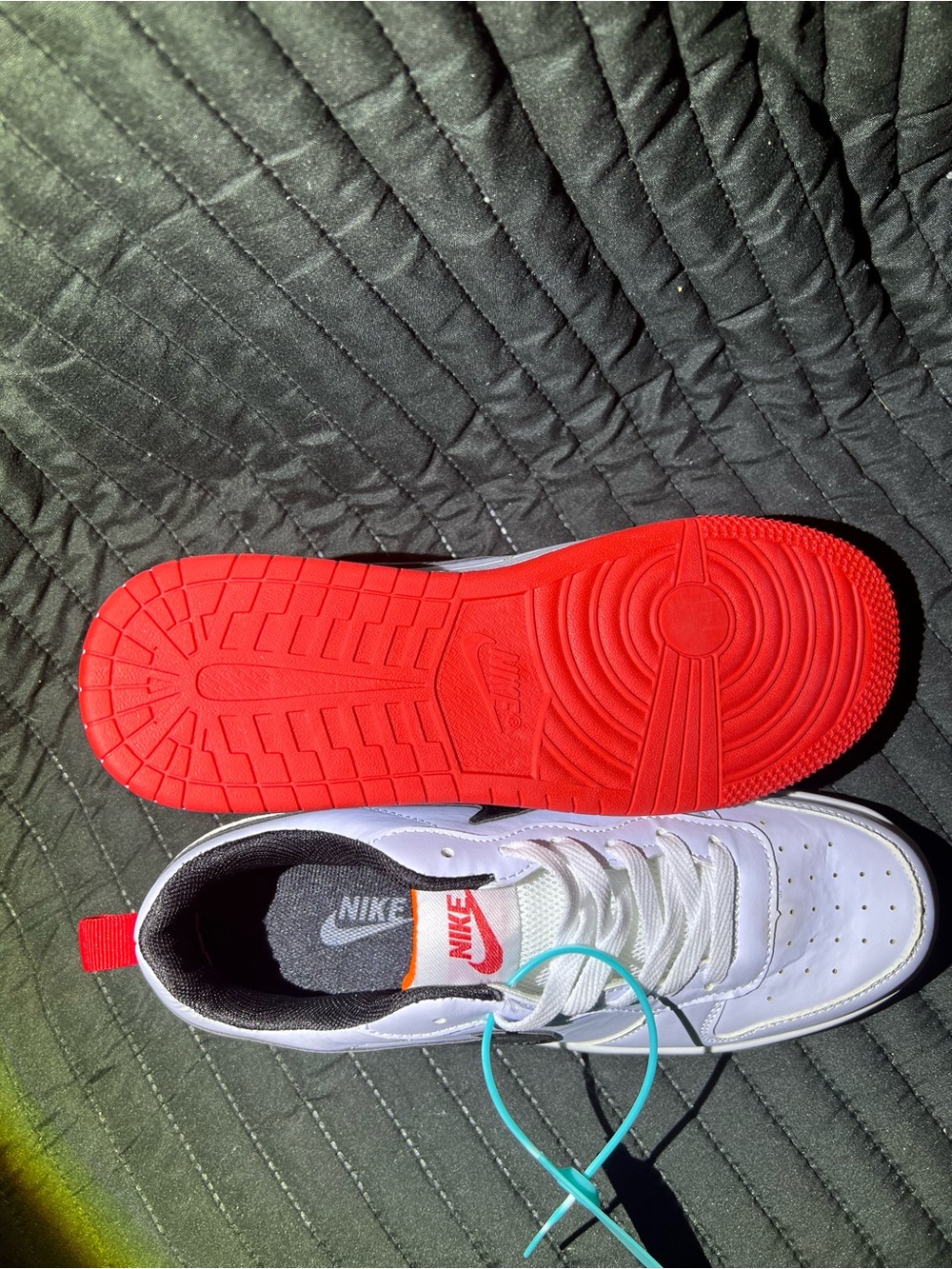 Nike White Low-Top Sneakers with Black Swoosh and Red Outsole - Picture 2 of 8